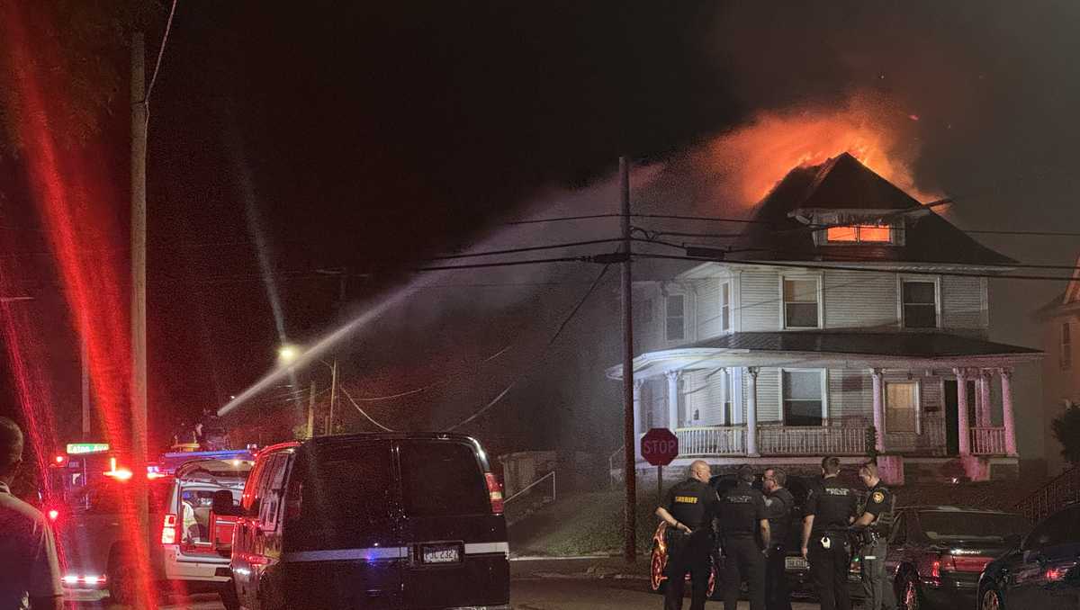 Police: 1 found dead after standoff ends in massive house fire in Hamilton