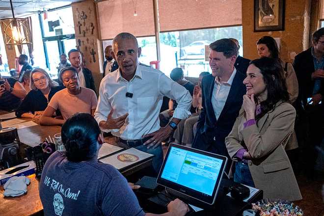 AUSTIN, TEXAS - MAY 12: Former President Barack Obama, Texas Senate candidate James Talarico (D-TX) and Texas gubernatorial candidate Gina Hinojosa (D-TX) meet patrons at the restaurant Taco Joint on the campaign trail on May 12, 2026 in Austin, Texas. (Photo by Joel Angel Juarez-Pool/Getty Images)
