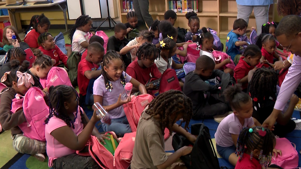 Students receive backpacks filled with supplies from WISN's Class Act School Supply Drive