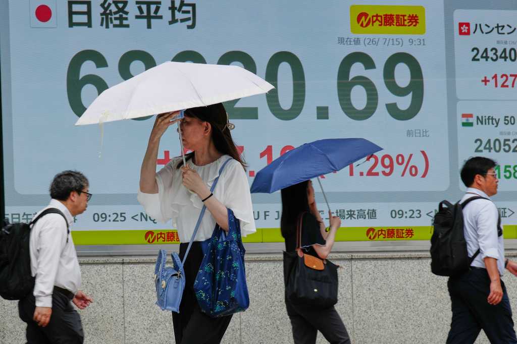 Asian shares sink, with Tokyo down nearly 5%