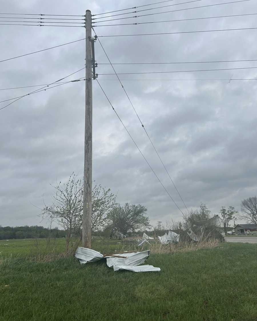 Power lines are down in Hillsdale, Kansas, after a tornado-warned storm on April 13, 2026.