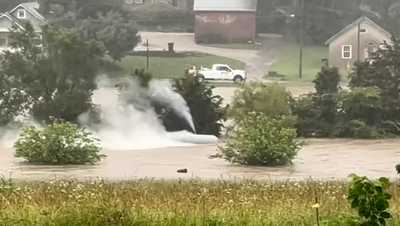 VIDEO: Violently leaking propane tank causes wild spectacle in Indiana floodwaters wdsu