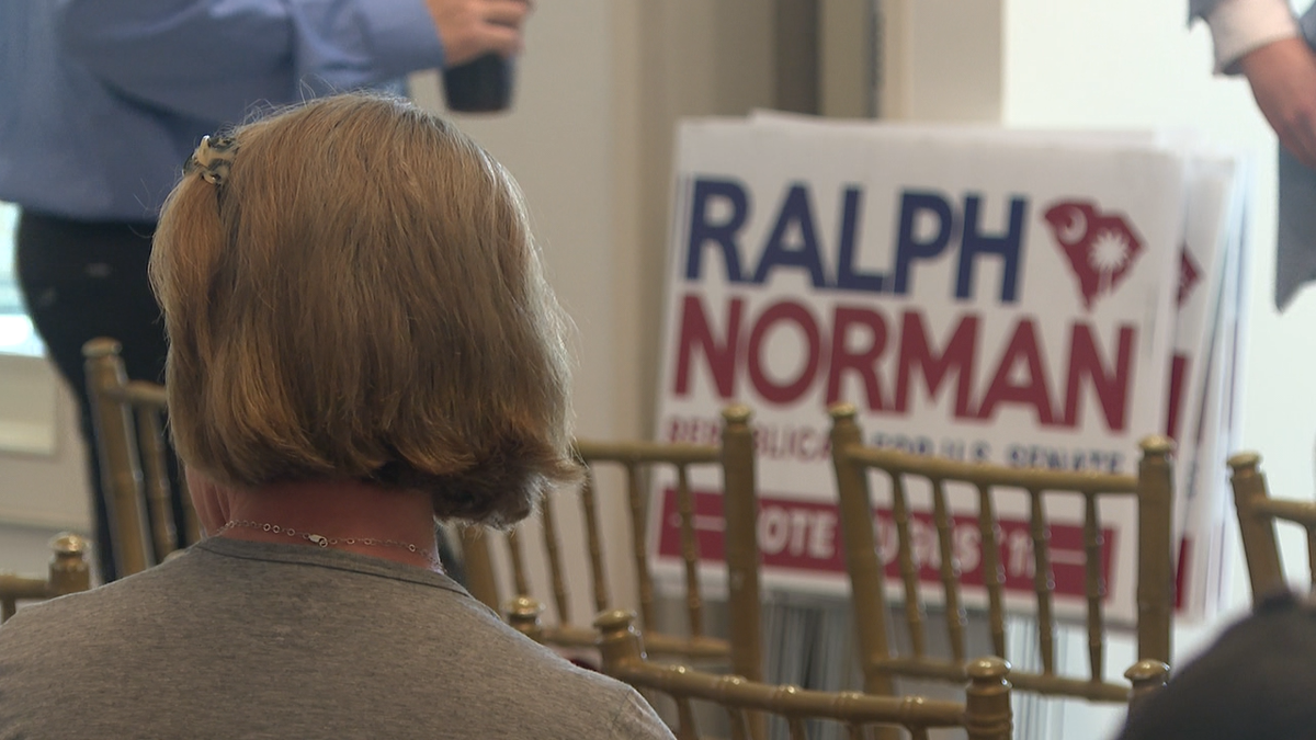 Norman rallies supporters before Tuesday’s vote