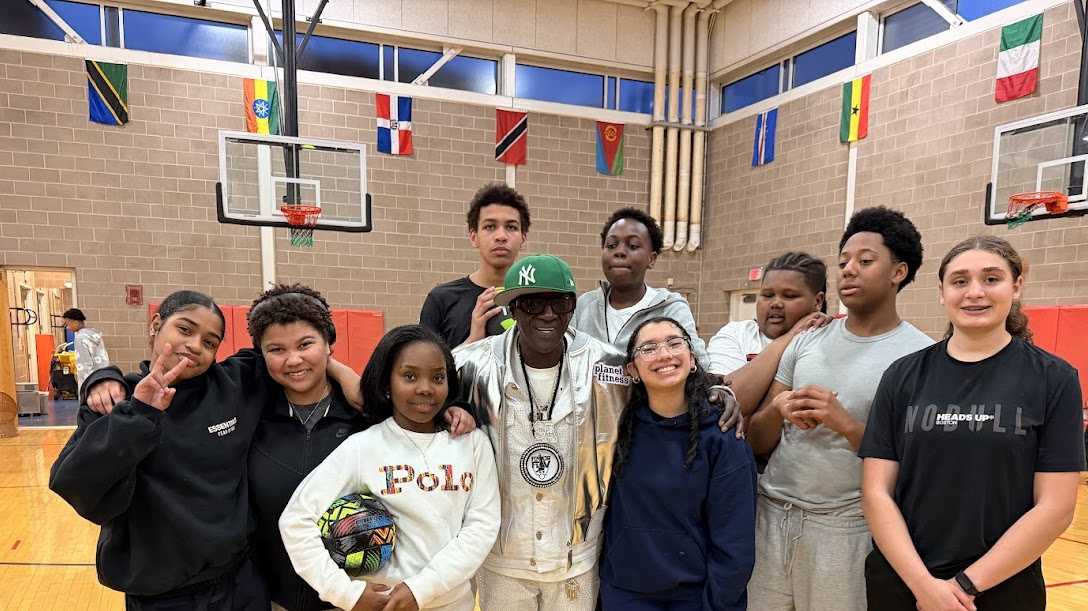 Flavor Flav helps stock Frisoli Youth Center with athletic equipment