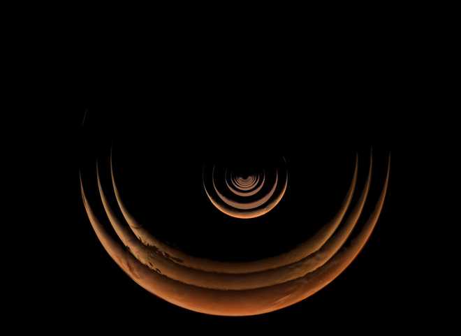 Time-lapse images taken from May 2 to 15 show the changing view of crescent Mars from the Psyche spacecraft.