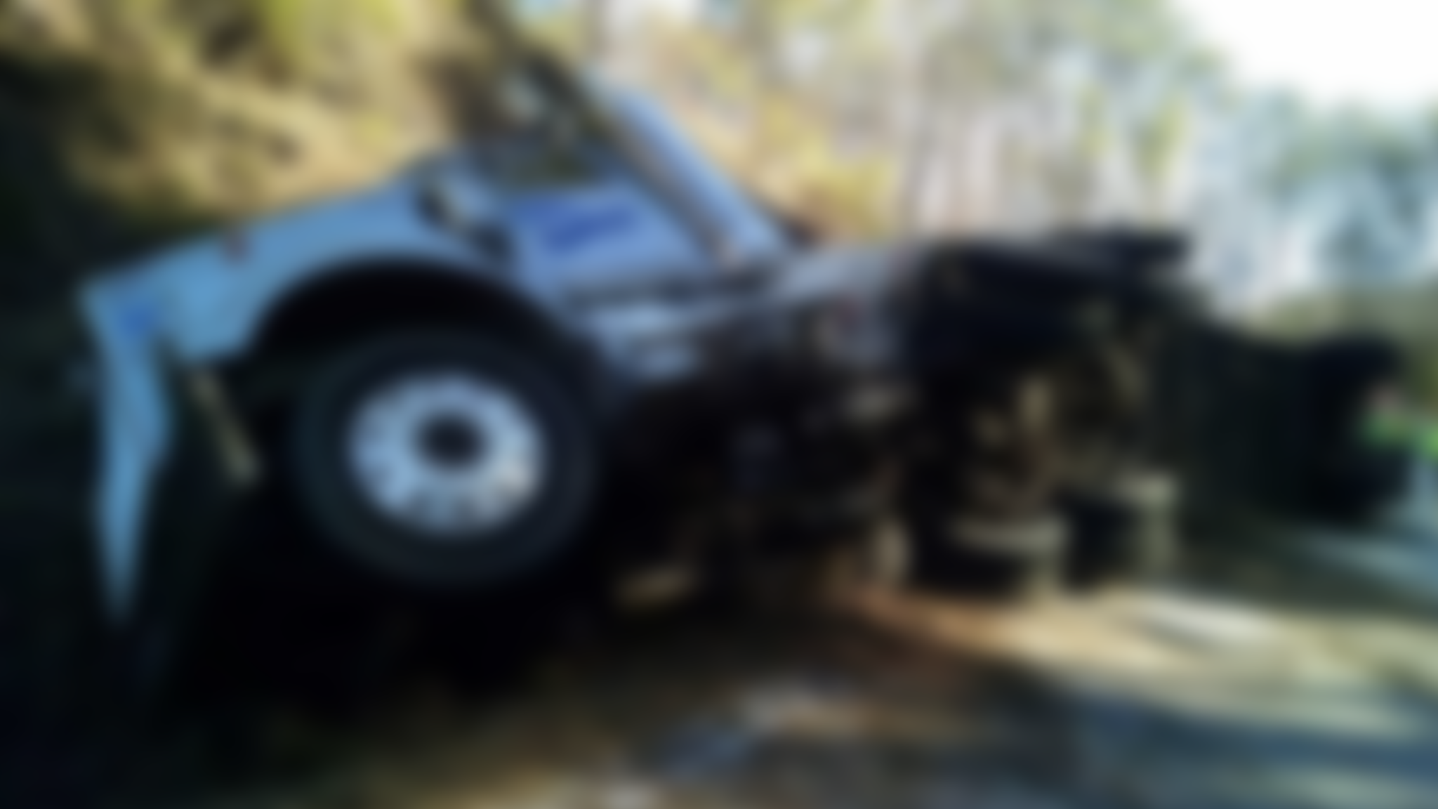 Portion of highway closed due to overturned tractor-trailer, officials say