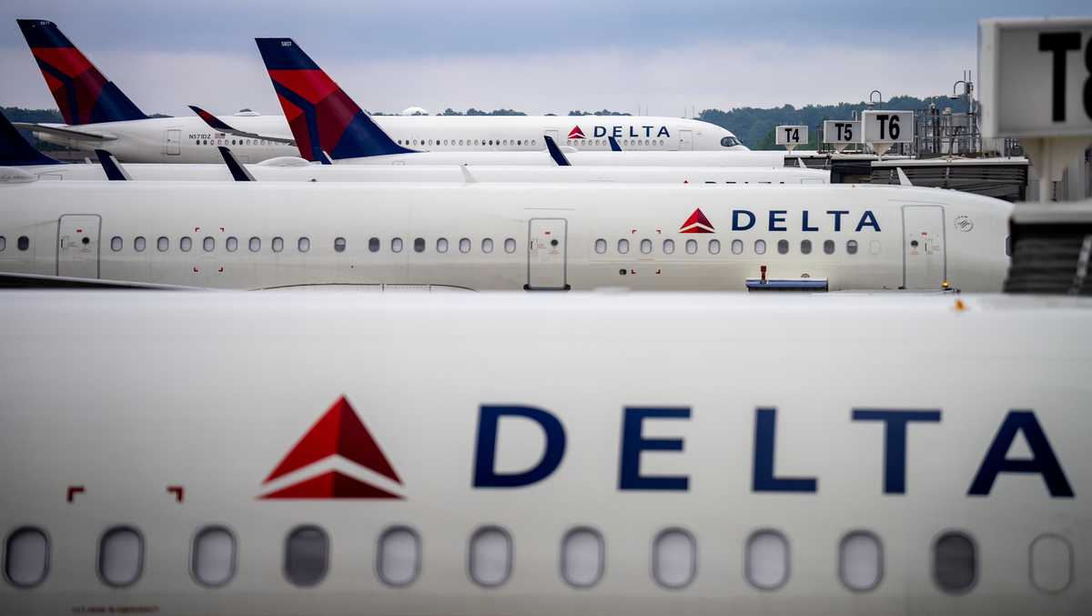 Passengers evacuated after Delta flight to Orlando returns to Atlanta due to report of fumes, airline says