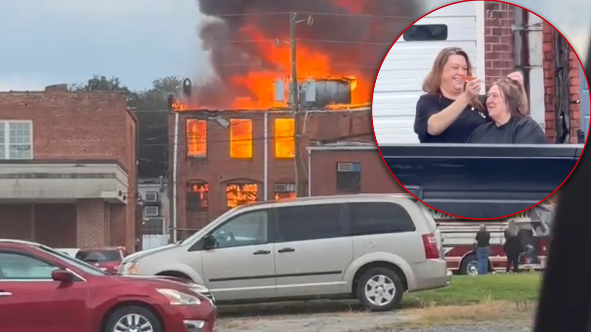 'We might as well finish': Barber finishes haircut in the street despite being evacuated for fire