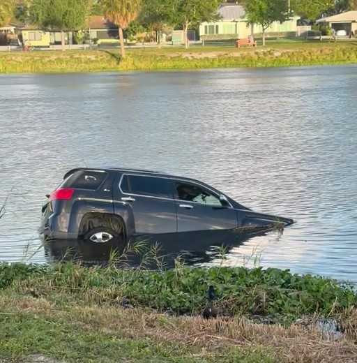 Officials investigate vehicle crash in canal at John Prince Park