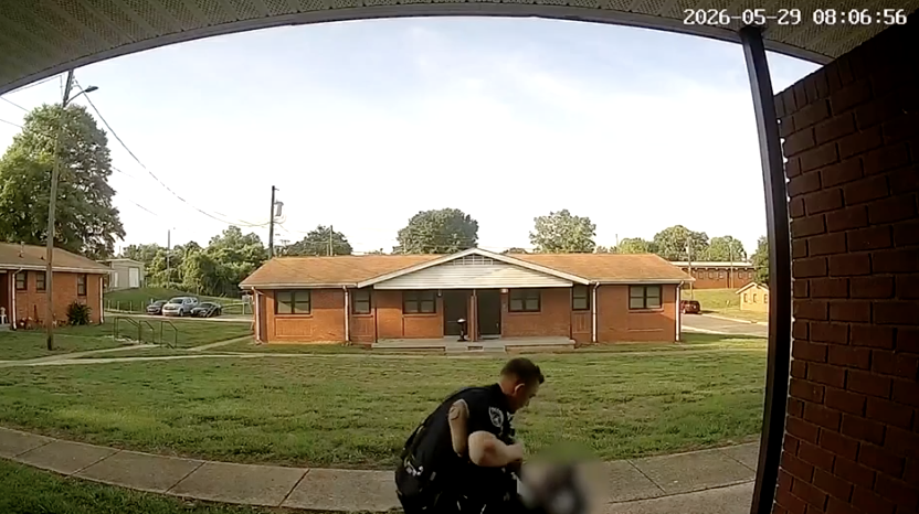 North Carolina officer charged with assault after video showed him punching woman during arrest