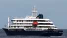 The MV Hondius cruise ship departs the port in Praia, Cape Verde, Wednesday, May 6, 2026. 