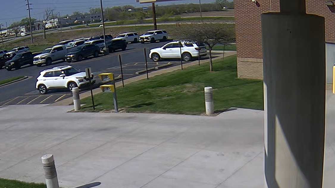 Surveillance video shows man crashing into Iowa county jail twice