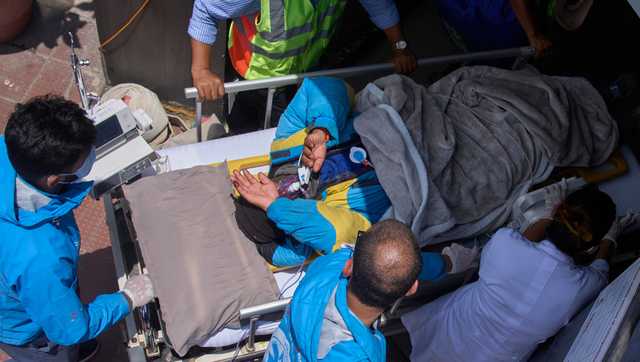 Guide missing for a week on Everest crawls back to base camp: 'Nothing short of a miracle'