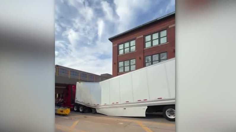 Railroad traffic halted after semi strikes Automobile Alley bridge