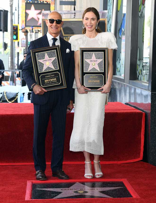 HOLLYWOOD, CALIFORNIA - APRIL 30: (L-R) Honorees Stanley Tucci and Emily Blunt attend the Hollywood Walk of Fame Star Ceremony celebrating Emily Blunt and Stanley Tucci in Hollywood, California on April 30, 2026. (Photo by Alberto E. Rodriguez/Getty Images for 20th Century Studios)