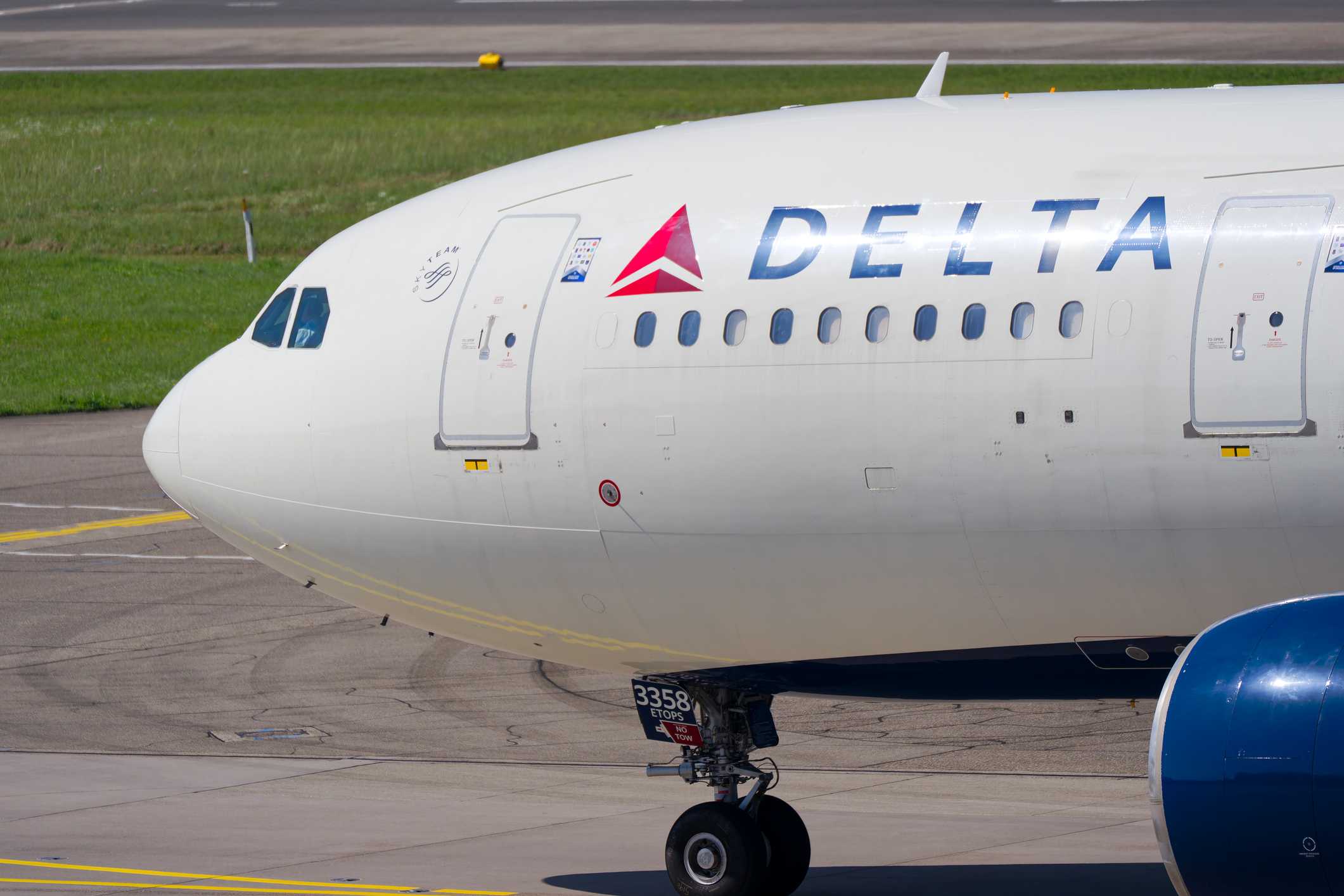 Delta passenger stole airport tug and drove around tarmac before crashing, official says