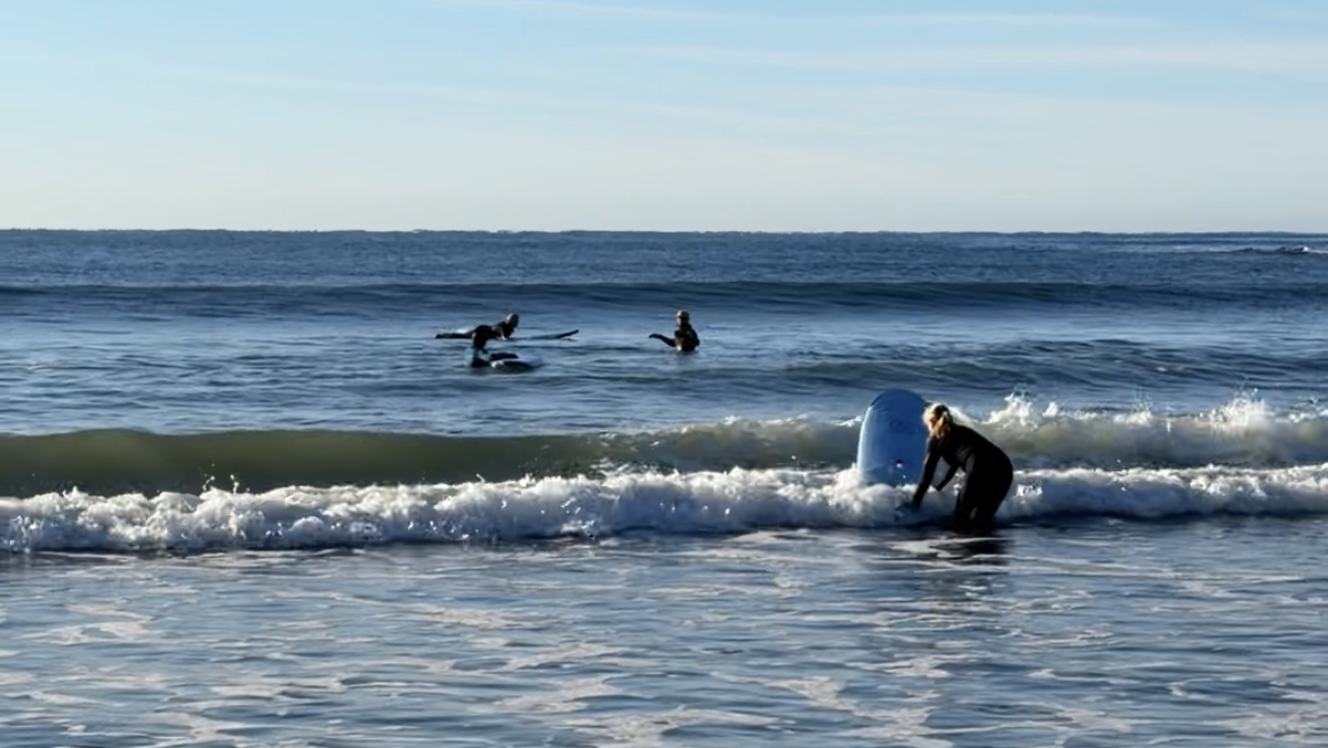 This surf shop in Kennebunk runs free surf lessons for moms