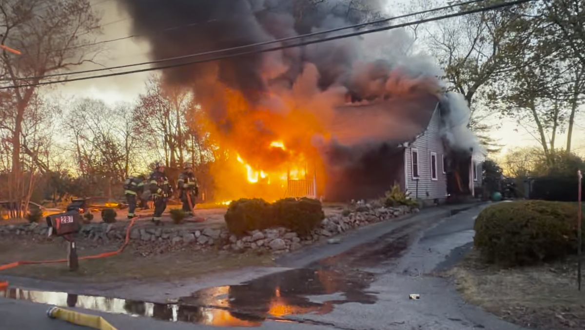 Crews battling large house fire in Wrentham