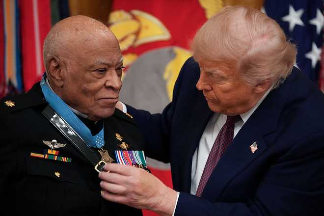 WASHINGTON, DC - JUNE 18:  Ret. Marine Major James Capers Jr. is presented the Medal of Honor by U.S. President Donald Trump (R) during a Medal of Honor Ceremony in the East Room of the White House on June 18, 2026 in Washington, DC. Capers, an 88-year-old Vietnam veteran, saved multiple lives of Marines under his command during a 1967 battle at Phu Loc, all while suffering from several gunshot wounds. President Trump will also award the Medal of Honor to Colonel John W. Ripley, U.S. Marine Corps (Posthumous), and Major Nicholas Dockery, U.S. Army (Retired). (Photo by Andrew Harnik/Getty Images)