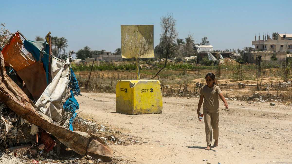 Israel building a miles-long earthen barrier inside Gaza, entrenching its division