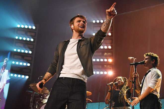LONDON, ENGLAND - APRIL 20: Alex Warren performs onstage during his Finding Family On The Road World Tour at The O2 Arena on April 20, 2026 in London, England. (Photo by Jim Dyson/Getty Images)