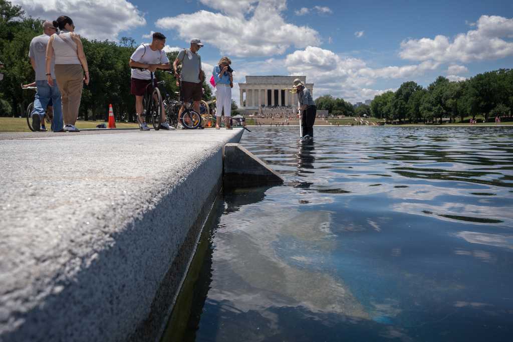 Algae and peeling blue material: Trump claims vandalism led to Reflecting Pool woes