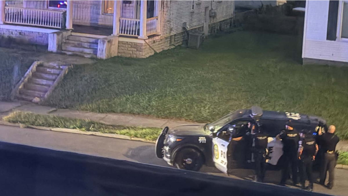 Large police presence seen outside home in Hamilton