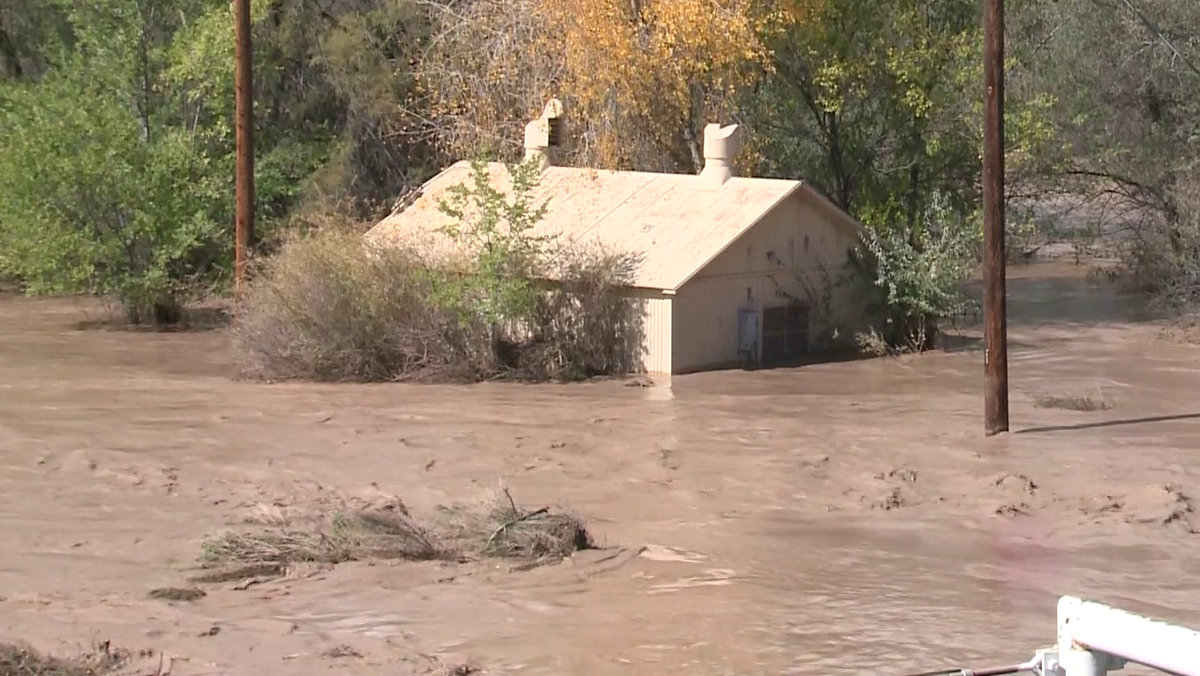 Family waits 12 hours for rescue after flooding forces them to rooftop of home in Bloomfield
