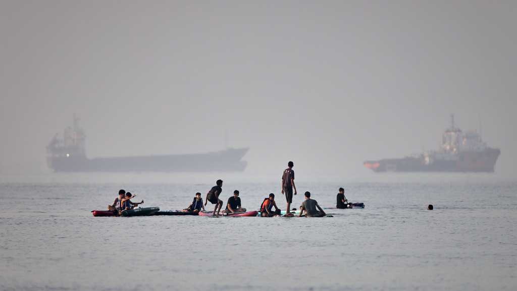 Air raid sirens blare in Bahrain as Iranian missiles, drones head for Gulf neighbors