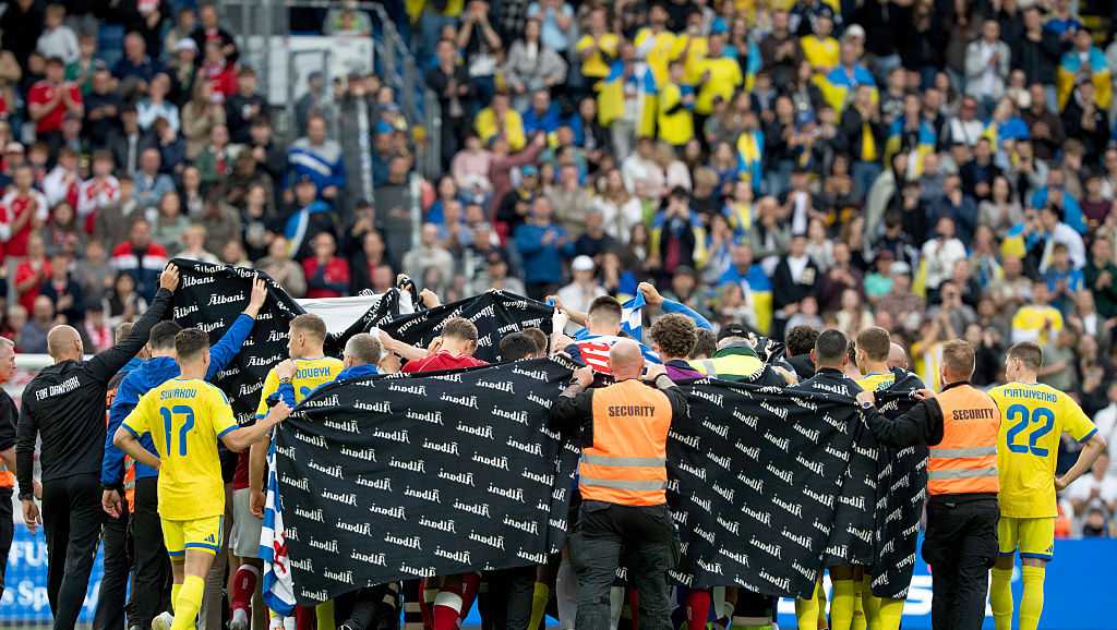Danish soccer star conscious after collapsing again during match, hospital tests underway
