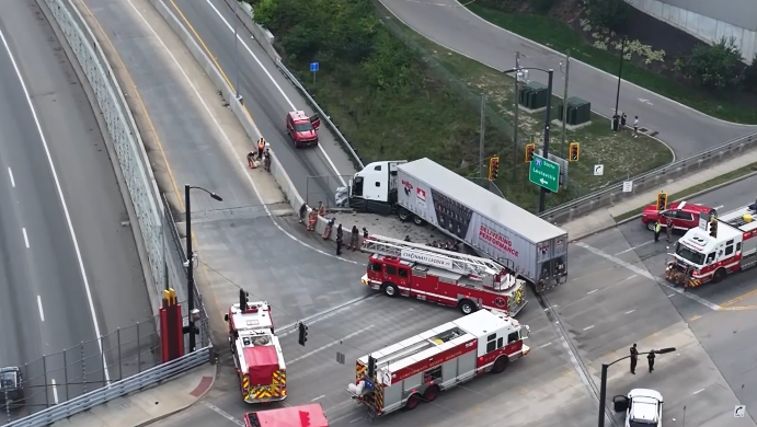 First responders recount rescue of 2 people after semi-truck dangles over I-71