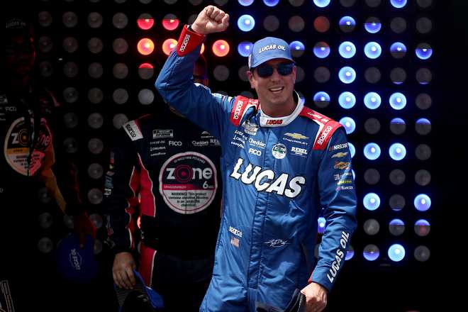 Kyle Busch, driver of the #8 Lucas Oil Chevrolet, walks onstage during driver intros prior to the NASCAR Cup Series All-Star Race at Dover Motor Speedway on May 17, 2026 in Dover, Delaware. (Photo by Meg Oliphant/Getty Images)