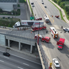 Road reopened after semi-truck hits barrier, dangles over I-71