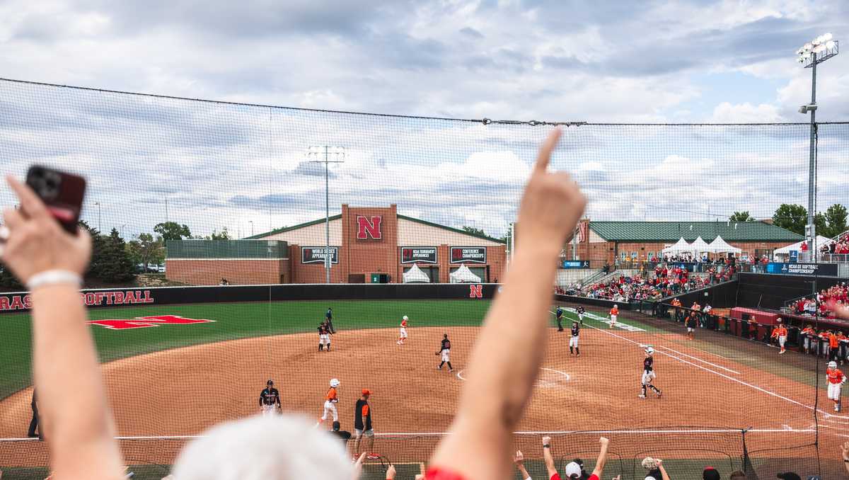 Nebraska softball coach Rhonda Revelle discusses strategy in Lincoln Regional