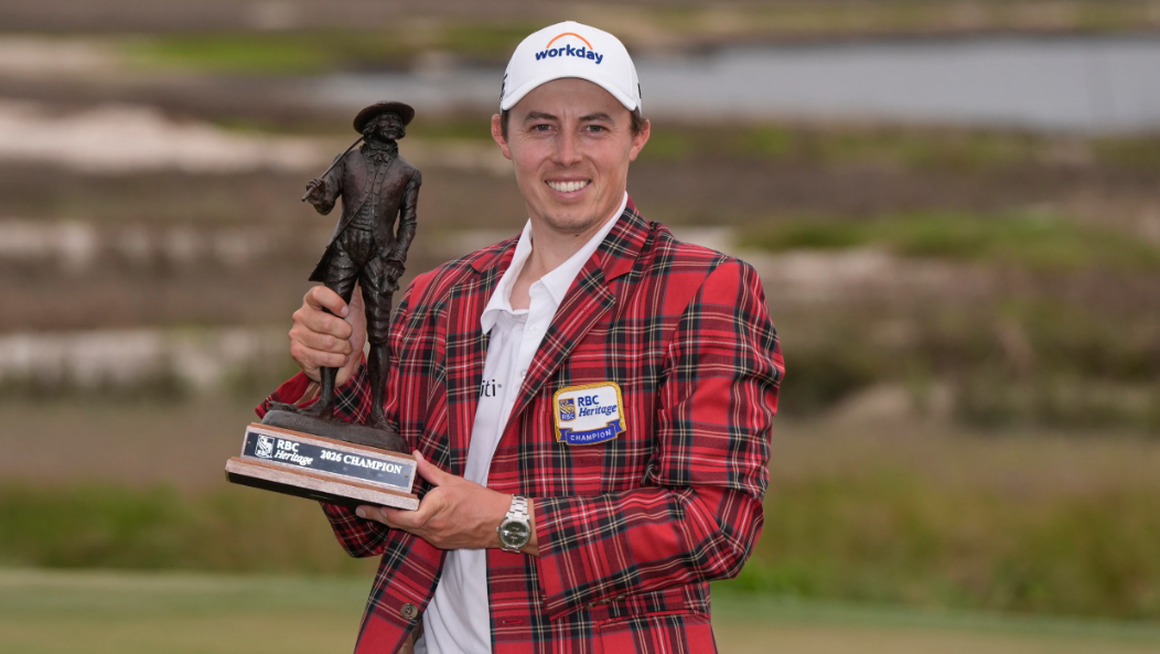 Photo: wjcl.com matt fitzpatrick 2026 rbc heritage winner, poses with the trophy after winning his second plaid jacket in three years
