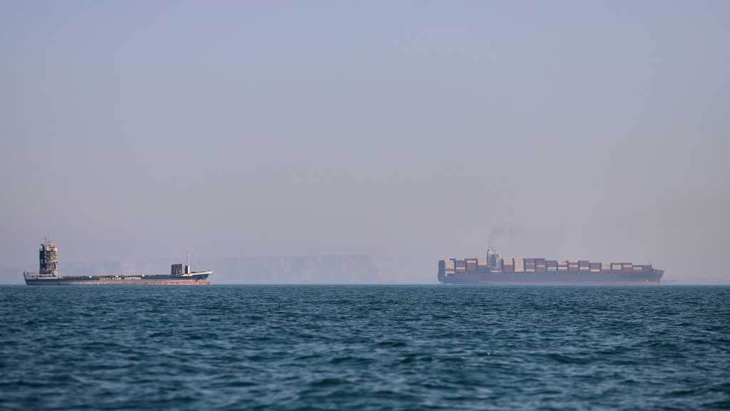 US and Iran exchange strikes as they struggle over Strait of Hormuz