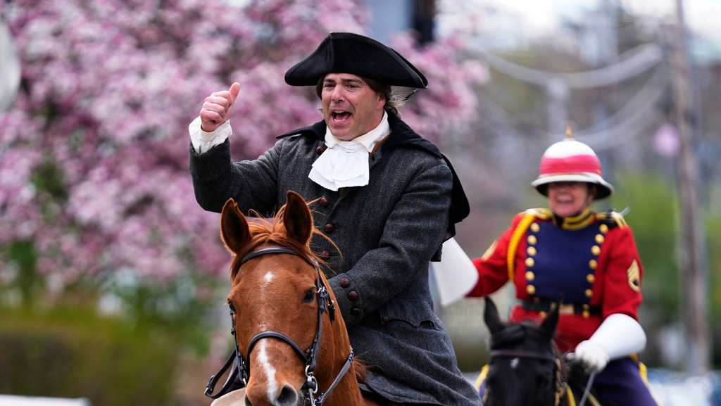 PHOTOS: Paul Revere's midnight ride unfolds in broad daylight — with a police escort