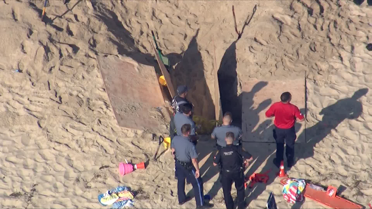 Doctor explains dangers of digging beach sand holes
