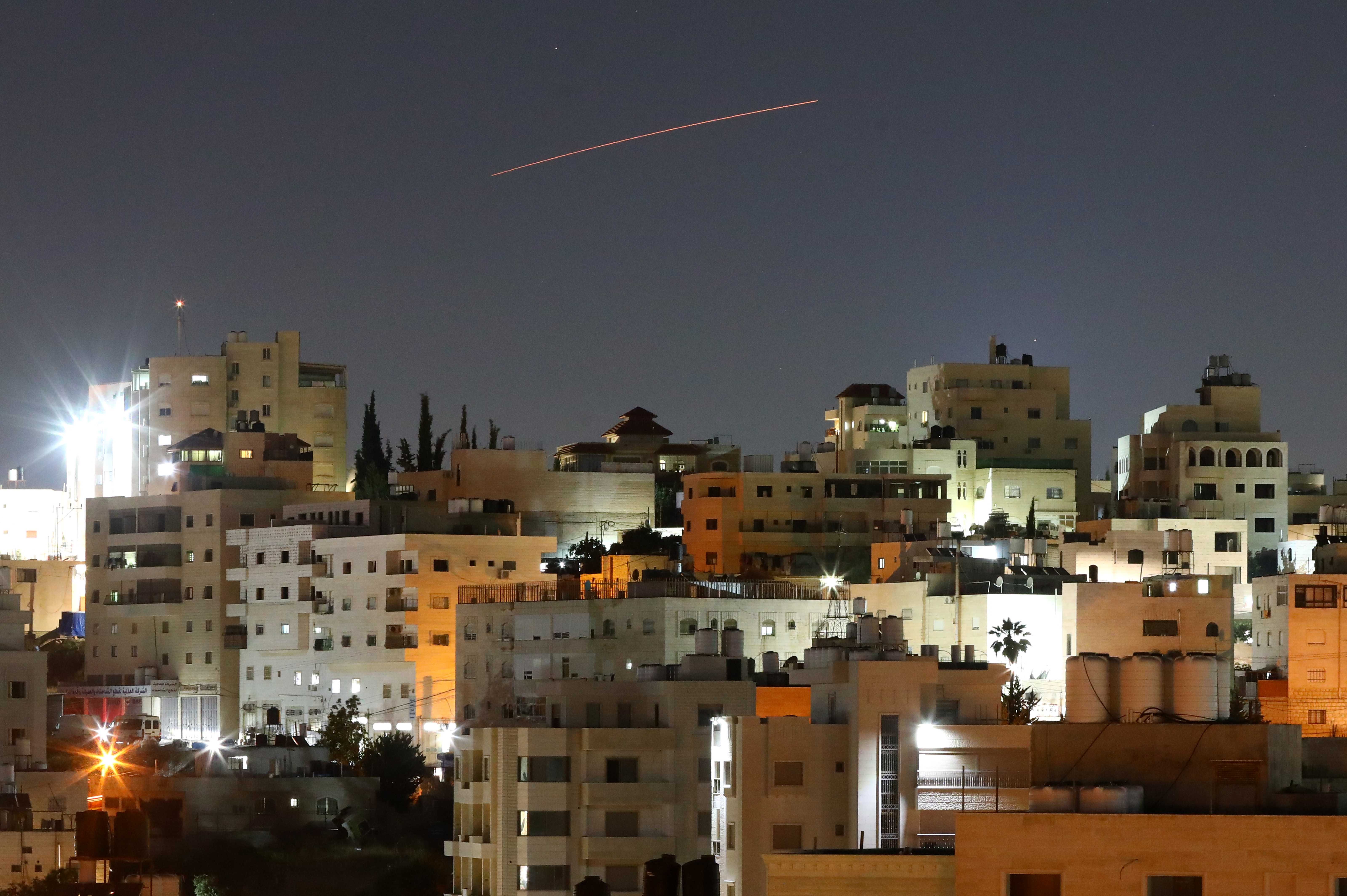 Israel and Iran pause attacks as President Trump presses for broader deal