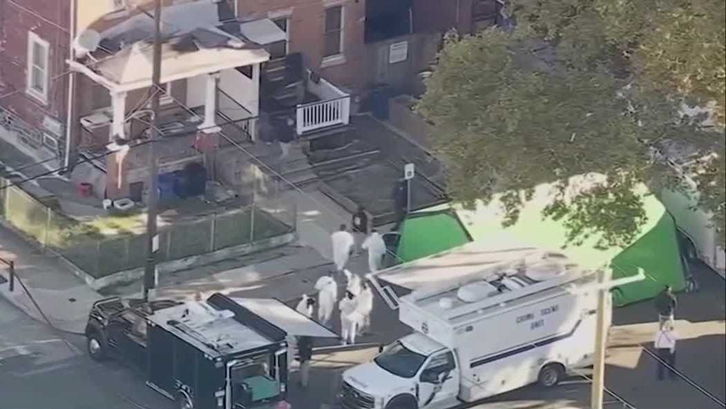 Investigators search front yard after luminol reveals DNA in Philadelphia home