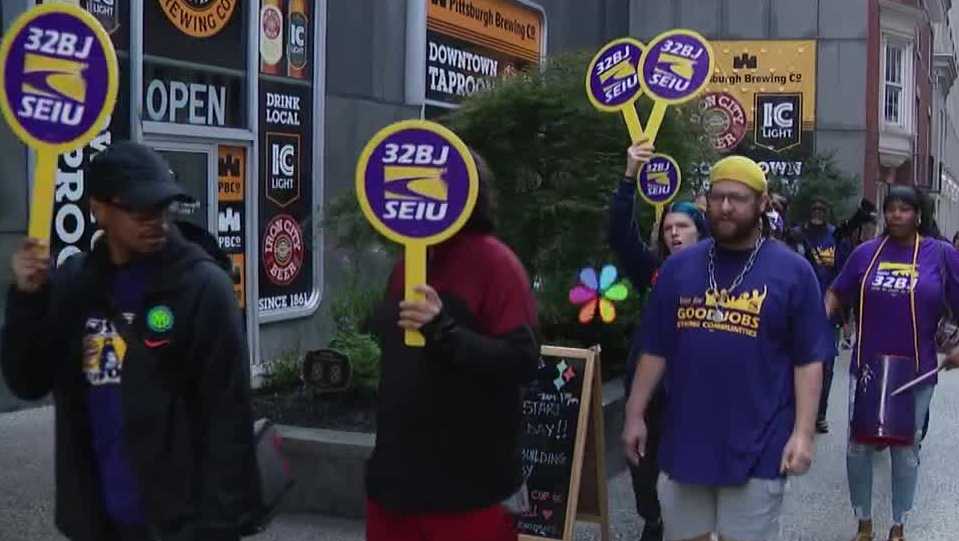 Union workers rally after layoffs and in support of amendments to city's TRID plan