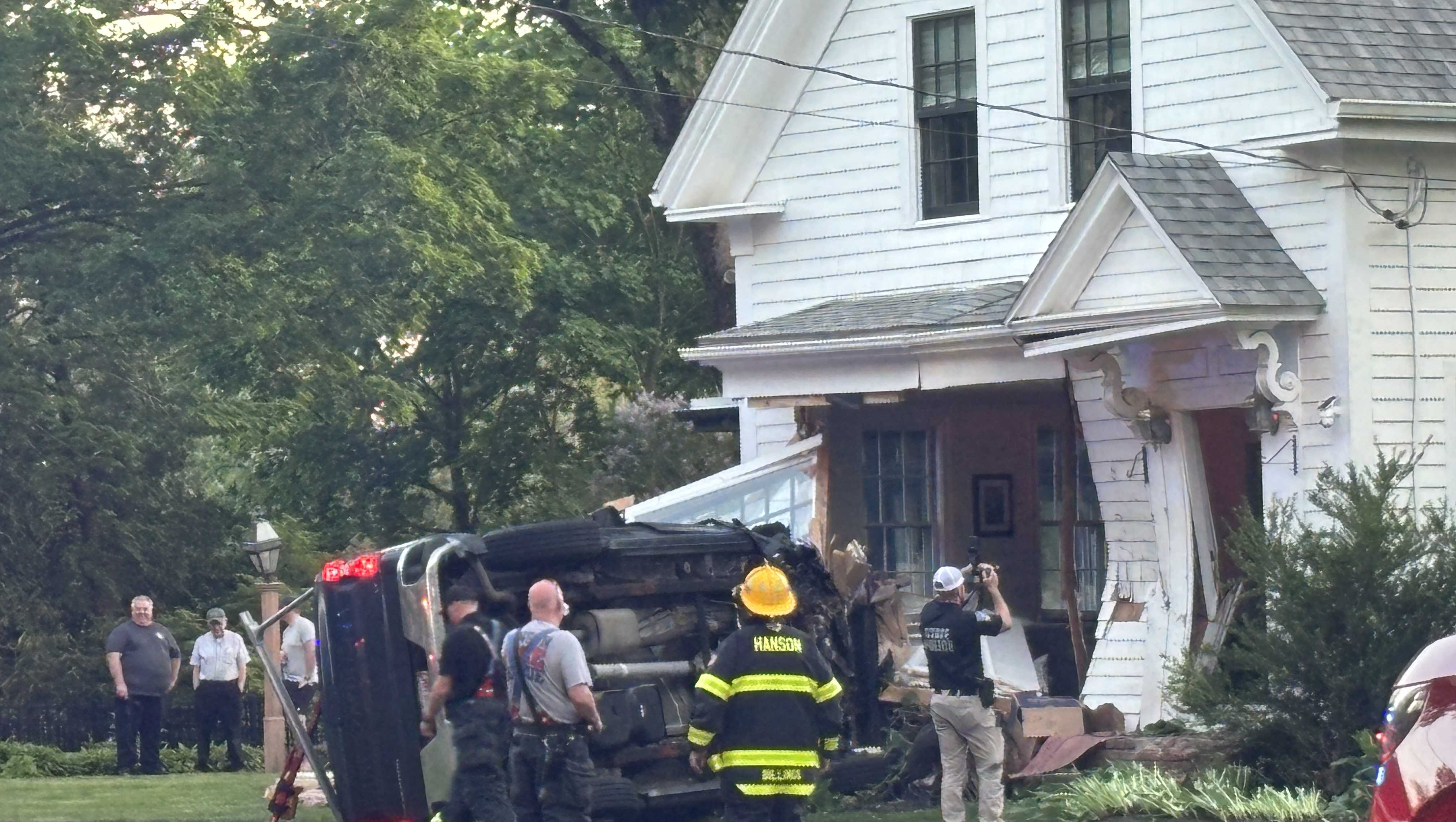 Man who died after his truck crashed into Mass. home identified