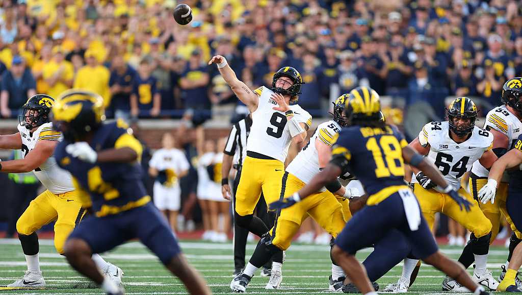 Iowa rises to No. 14 after Hank Brown's late TD stuns Michigan in Ann Arbor