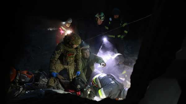 Rescue workers clear the rubble of a residential building destroyed by a Russian airstrike in Zaporizhzhia, Ukraine, Saturday, Oct. 10, 2026. (AP Photo/Kateryna Klochko)