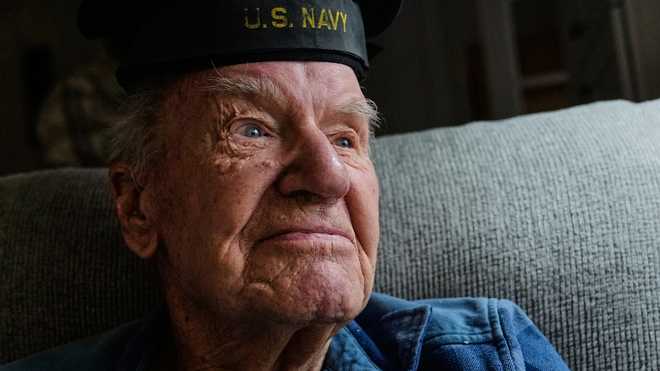 Freeman K. Johnson, a 106-year-old Pearl Harbor survivor, listens to a question during an interview at his home, May 6, 2026, in Centerville, Mass.
