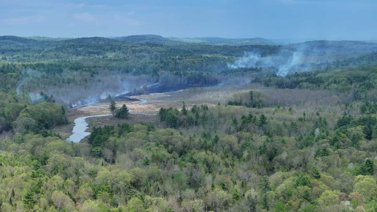 Greene brush fire burning along railroad tracks in Maine town