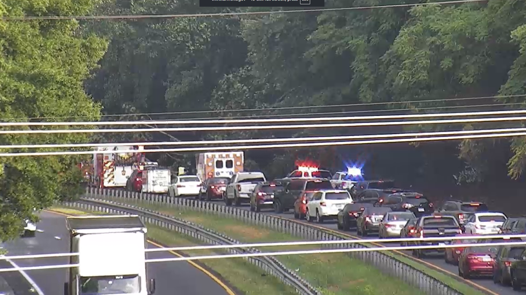Debris, downed trees back up traffic on US-52 South in Forsyth County