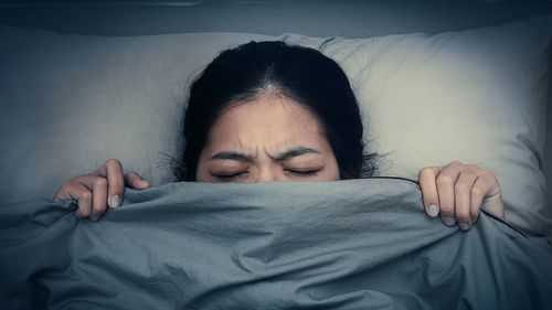 Letting go of any worries and meditating can help before bedtime, experts say.