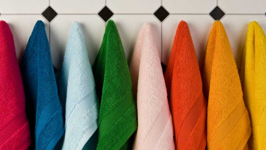 Multi-coloured towels hanging up