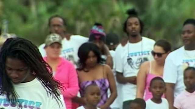 Hundreds march to support family of slain toddler